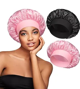 Pink and black satin sleep caps with wide elastic bands for hair care and protection