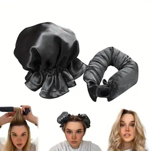 Detail von schwarzem satin-hitzelosem Lockenwickler-Set und Haarkappe mit Schritten