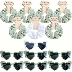 14-piece set featuring sage green and white satin scrunchies with heart-shaped sunglasses