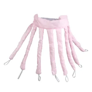 Vue détaillée du ruban à boucler sans chaleur rose pâle à 8 branches et tissu matelassé