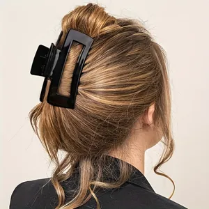 Große matt schwarze rechteckige Haarklammer für elegantes Styling dicker Haare