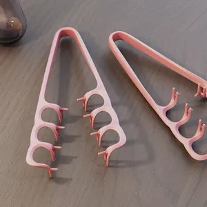 Set di 2 clip per snack in plastica rosa per mangiare senza sporcarsi le dita