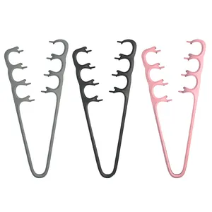 Separatori per dita in silicone in grigio, nero e rosa per pedicure e cura dei piedi