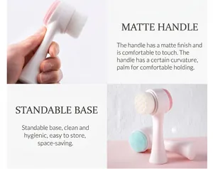 Brosse nettoyante visage double face avec poils souples et manche mat ergonomique blanc