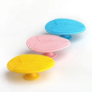 Silicone baby hair and scalp massager brush set in blue, pink, and yellow colors