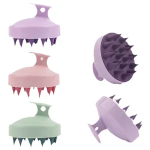 Brosses de massage du cuir chevelu en violet rose et bleu avec poils en silicone