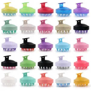 Multiple colorful silicone scalp massage brushes in a variety of vibrant and pastel colors