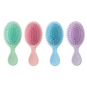 Set aus vier Mini-Luftkissen-Massagebürsten in Pastellfarben für Reise und Haarpflege