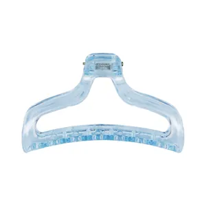 Macro view of light blue translucent shark hair claw with smooth wave design