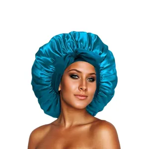 Peacock blue satin hair bonnet for sleeping with wide elastic band and front bow decoration