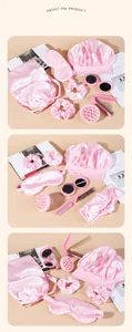 Pink satin hair care set including sleep mask, bonnet, brushes and scalp massager