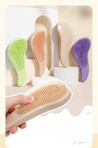 Detail view of the ergonomic wheat straw hairbrush with flexible and dense bristles