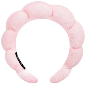 Pink puffy cloud headband in soft terry cloth with handmade label for skincare