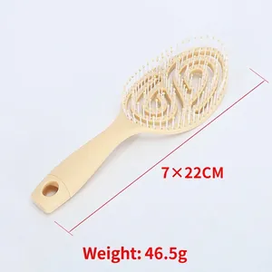 Light beige hollow out hair brush with ergonomic handle for scalp massage and styling