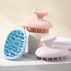 Ergonomic silicone scalp massager brushes in pink, blue, and purple for hair washing