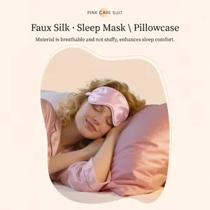 Pink faux silk sleep set including eye mask and pillowcase for comfortable sleeping