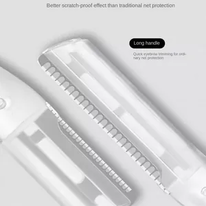 Detail of eyebrow razor head featuring a fine safety guard mesh and white long handle
