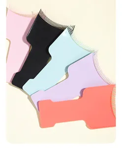 Close-up of 5-color plastic mascara shields with curved combs for clean eyelash makeup