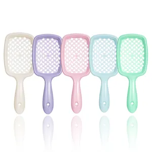 Five-piece set of macaron-colored hollow hairbrushes with ergonomic handles and mesh design