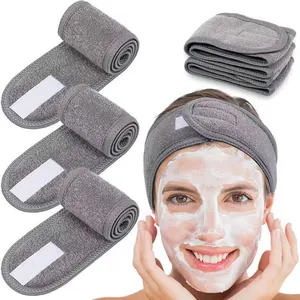 Gray microfiber headband with adjustable velcro closure for skincare and yoga