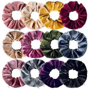 Detail of velvet zipper scrunchies set showing 12 colors and hidden storage pocket