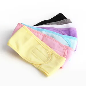 Close-up of colorful absorbent terry cloth headbands with adjustable velcro closure