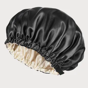 Detail of double-layered satin hair bonnet with smooth fabric and elastic band