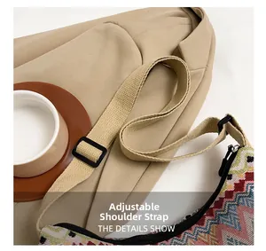 Detail view of the adjustable shoulder strap on this ethnic jacquard crossbody bag