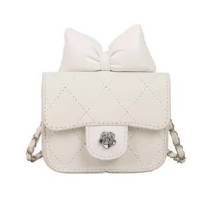 White quilted mini handbag with camellia lock, leather bow and chain shoulder strap