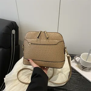 Luxurious khaki woven texture square crossbody bag with gold hardware and dual zippers