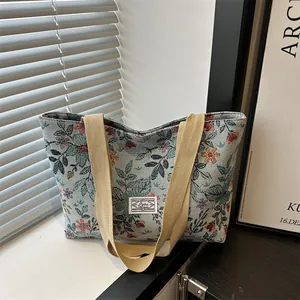 Large capacity vintage floral canvas tote bag with woven shoulder straps for daily commute