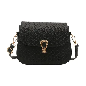 Minimalist black woven texture square crossbody bag with gold horseshoe buckle
