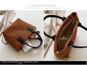 Detail of brown corduroy tote bag showing spacious main pocket for phone and keys