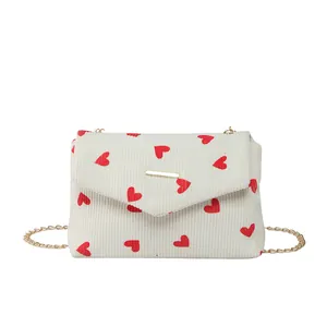 Cute strawberry cream corduroy square bag with heart print and gold chain strap