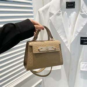 Retro khaki croc-embossed top handle handbag with metal twist lock and shoulder strap