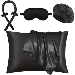 Five-piece black satin sleep set including pillowcase, eye mask, and heatless hair curler kit