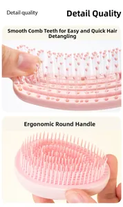 Detail view of pink detangling hairbrush with flexible bristles and ergonomic handle