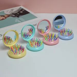 Klappbare Haarbürste mit Spiegel in Macaron-Farben und Wellen-Massagenoppen
