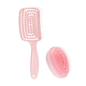 Pink hair brush set including a spiral vented massage comb and a portable egg brush
