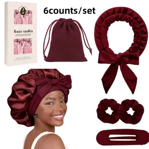 Detail of 6pcs dark red velvet heatless hair curler set with satin sleep cap and hair bow
