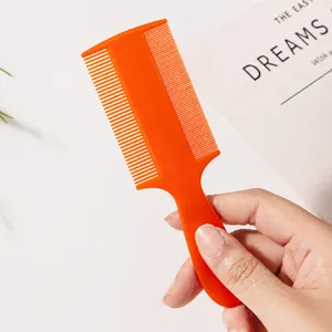 Peigne à poux orange double face avec poignée ergonomique pour le nettoyage du cuir chevelu