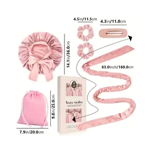 Pink satin heatless hair curler set with storage bag, sleep cap, and hair accessories