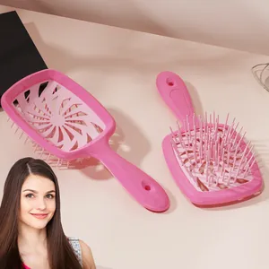 Skelettbürste zum Föhnen und Kopfhautmassage in leuchtendem Rosé-Pink Design