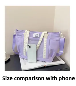 Detailed size comparison of purple tote bag with a white smartphone to show large capacity