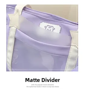 Detail showing the frosted transparent divider inside the purple Ita bag with star patch