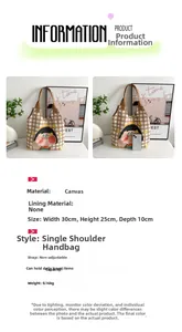 Detailed size view of yellow plaid canvas tote bag with cartoon girl print and brown handle