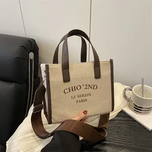 Sac fourre-tout rétro en toile avec garniture en cuir brun et imprimé LE SEREIN PARIS