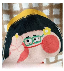 Close-up of cute cartoon girl print on brown checkered canvas material of the tote bag