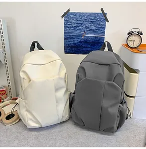 Sac à dos minimaliste en toile à poches multiples en couleurs beige et gris foncé