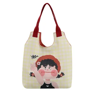 Yellow plaid canvas tote bag with cute cartoon girl illustration and red shoulder straps